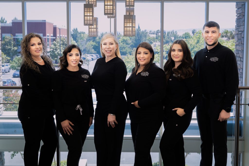 McNemar Cosmetic Surgery team wearing black