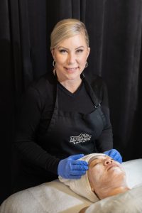 Deborah performing an esthetician services at McNemar Plastic Sugery